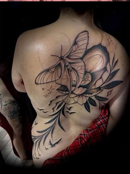 Large detailed moth back piece tattoo by Clayton
