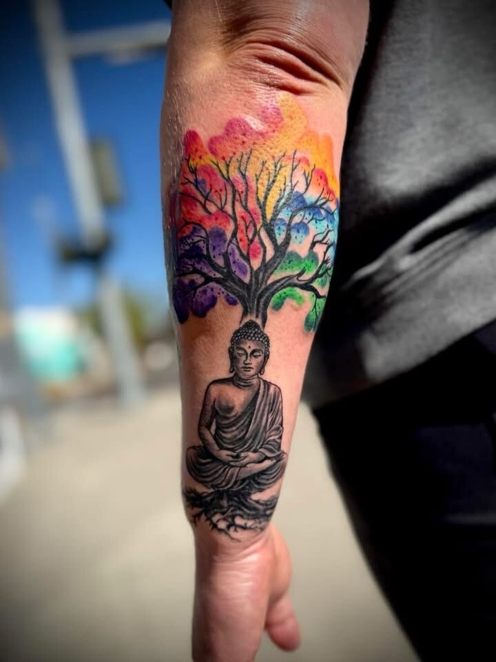 Buddha with colorful watercolor tree tattoo by Sean
